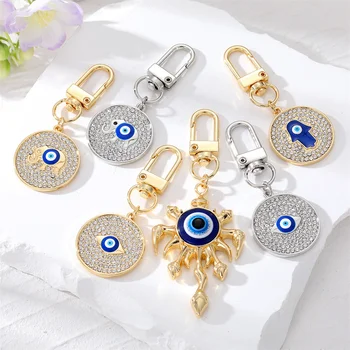 Роскошные брелки для ключей с голубыми глазами из горного хрусталя, креативные геометрические круглые металлические брелоки от сглаза, брелки для наушников, подвески, ювелирные украшения в подарок